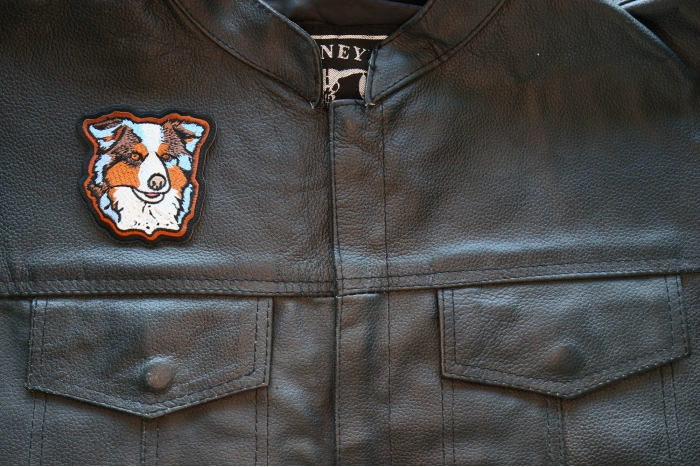 Aussie Shepherd Dog Iron on Patch shown on leather vest