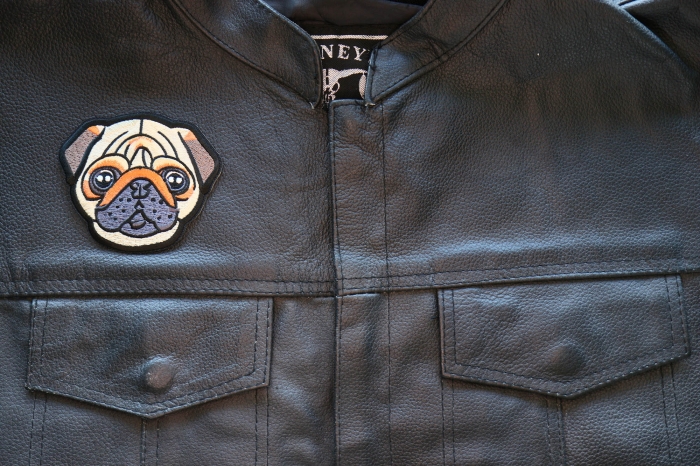 Sweet Pug Iron on Patch shown on leather vest