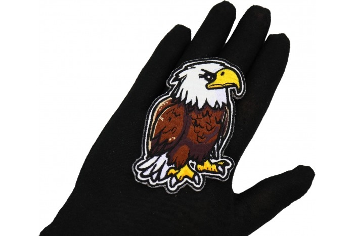 Cartoon Eagle Patch shown on hand for size comparison