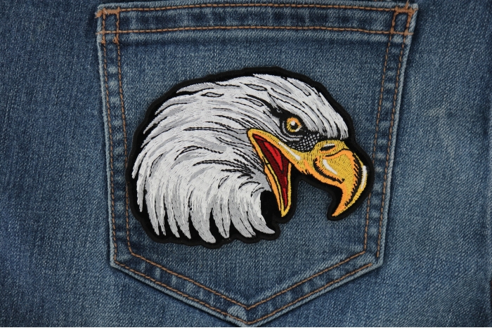Eagle Head Facing Right Iron on Biker Patch shown on jeans
