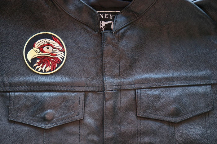 Eagle Eye Iron on Patch shown on leather vest
