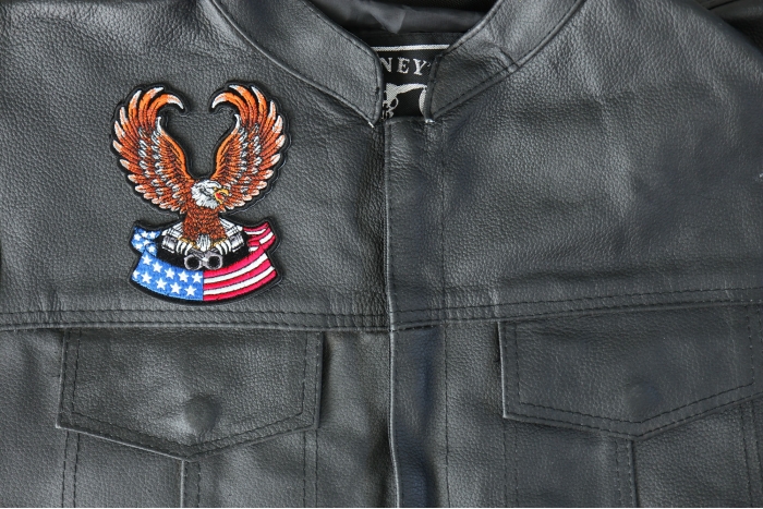 Patriotic Eagle with pistons small iron on biker patch - 3.6x4.4 inch - Embroidered Iron on Patch shown on leather vest