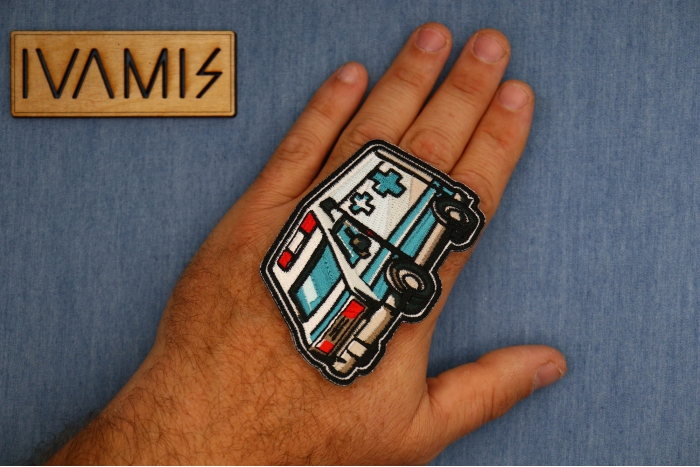 Ambulance Patch shown on hand for size comparison