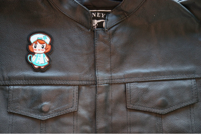 Lady Nurse Patch, Iron on Patches shown on leather vest