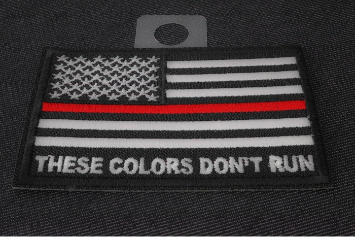 These Colors Don't Run Red Line US Flag Patch diagonal view