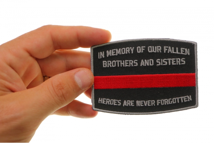 Fallen Firefighter Memorial Patch shown on hand for size comparison