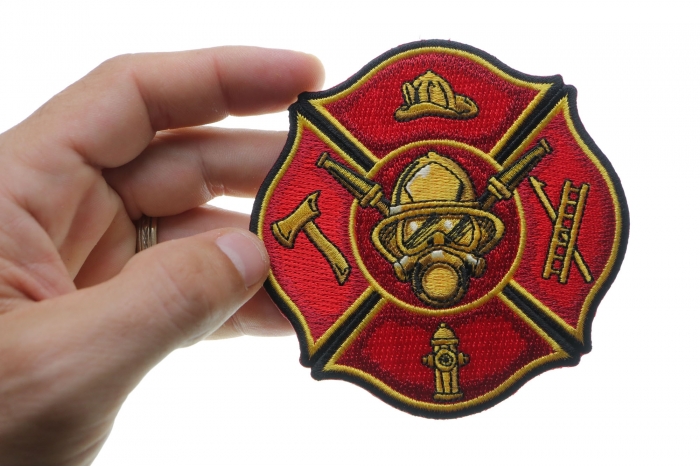 Fire Department Patch for Firefighters shown on hand for size comparison
