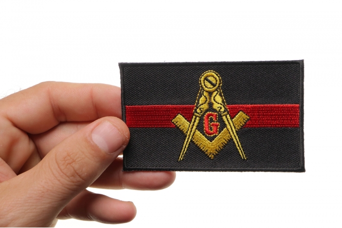 Masonic Thin Red Line For Fire Fighters Iron on Patch shown on hand for size comparison