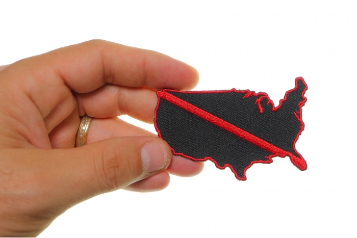 Red Line US Map Firefighters Patch shown on hand for size comparison