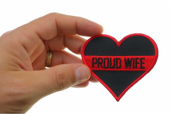 Thin Red Line Proud Wife Patch For Firefighters shown on hand for size comparison