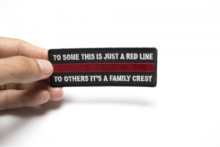 To Some This is Just a Red Line To Others It's a Family Crest Patch shown on hand for size comparison