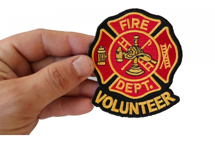 Volunteer Fire Dept Patch shown on hand for size comparison