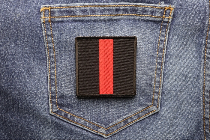 Red Line Firefighter Family Patch shown on jeans