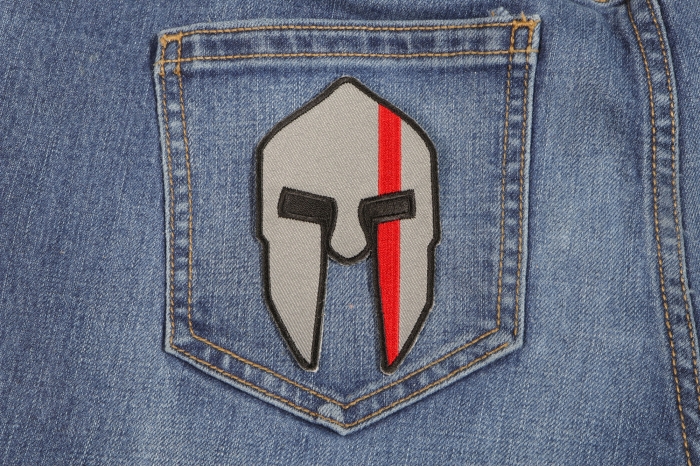 Spartan Helmet Red Line Firefighter Patch shown on jeans