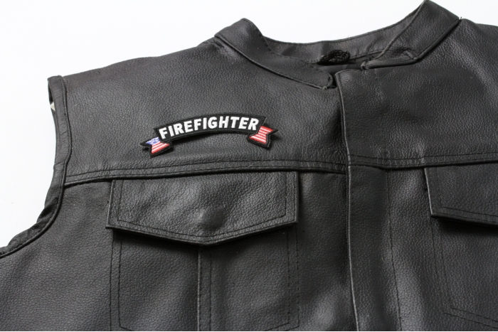 Fire US Flag Small Rocker Patch - 4x1.5 inch. Embroidered Iron on Patch shown on leather vest