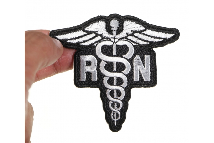 Registered Nurse RN Patch shown on hand for size comparison