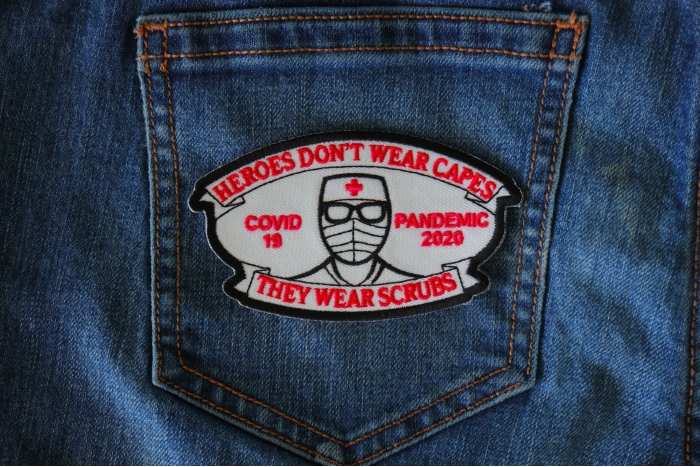 Heroes don't wear capes they wear scrubs Covid 19 Pandemic Patch shown on jeans