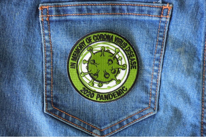 In memory of Corona Virus Disease 2020 Pandemic Iron on Patch shown on jeans