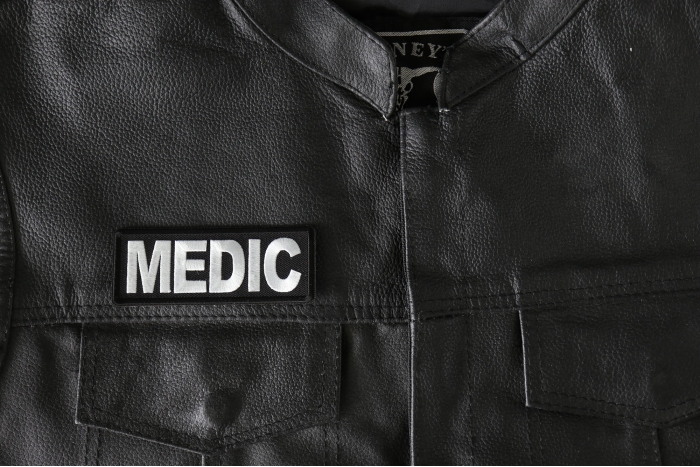 Medic Patch - 4x1.5 inch - Embroidered Iron on Patch shown on leather vest