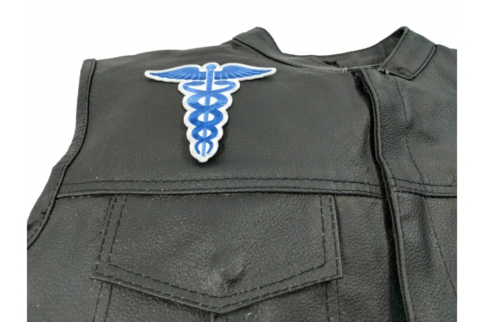Medic Symbol Patch Blue - 4x3.8 inch. Embroidered Iron on Patch shown on leather vest