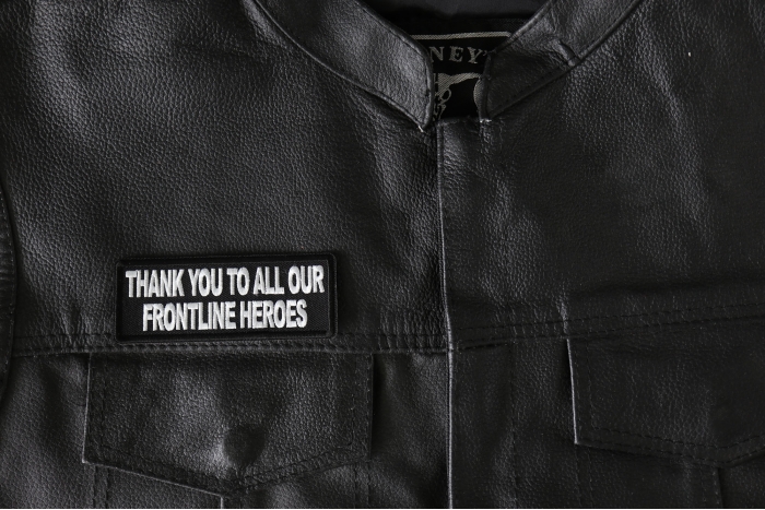 Thank you to all our Frontline Heroes Patch - 4x1.5 inch - Embroidered Iron on Patch shown on leather vest