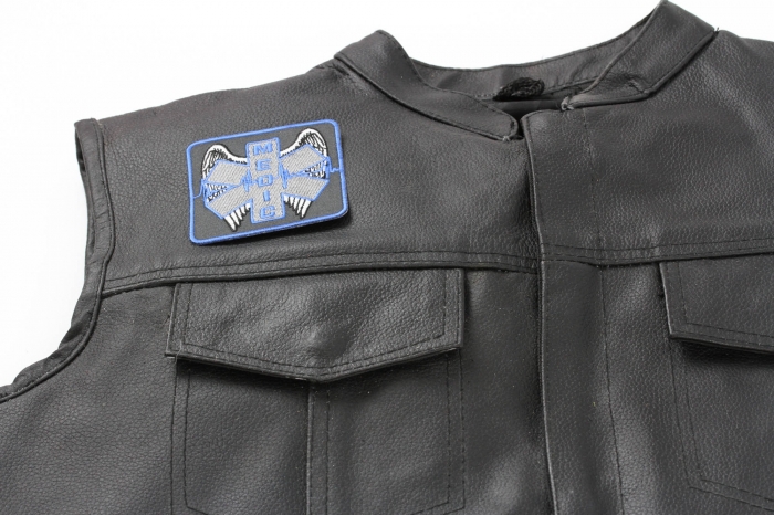 Winged Medic Patch - 3x3 inch. Embroidered Iron on Patch shown on leather vest
