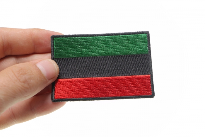 African Flag Patch shown on hand for size comparison