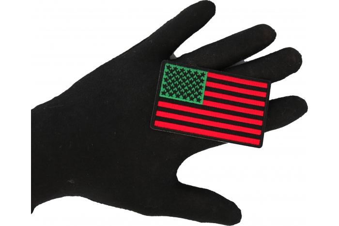 American Flag with African Colors Iron on Patch shown on hand for size comparison