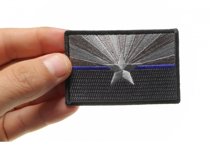 Arizona State Flag Blue Line Police Patch shown on hand for size comparison