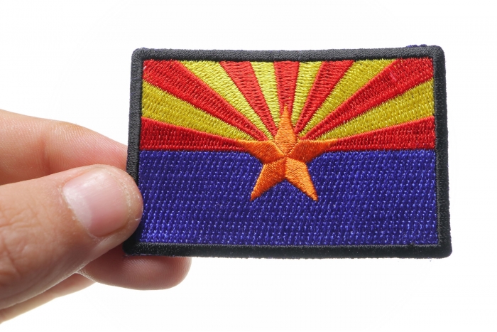 Arizona State Flag Patch shown on hand for size comparison