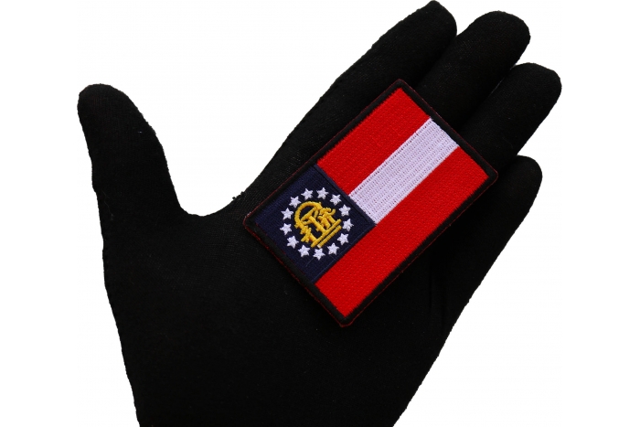 Georgia State Flag Patch shown on hand for size comparison