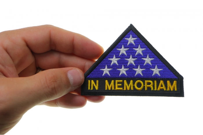 In Memoriam Folded Flag Patch shown on hand for size comparison