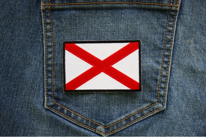 Alabama State Flag Patch shown on jeans