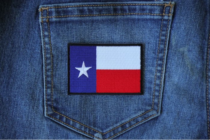 Black Border Texas Flag Patch shown on jeans