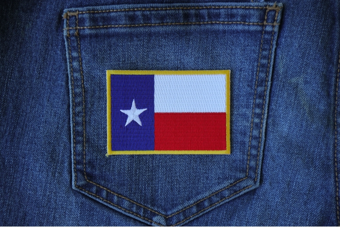 Gold Border Texas Flag Patch shown on jeans