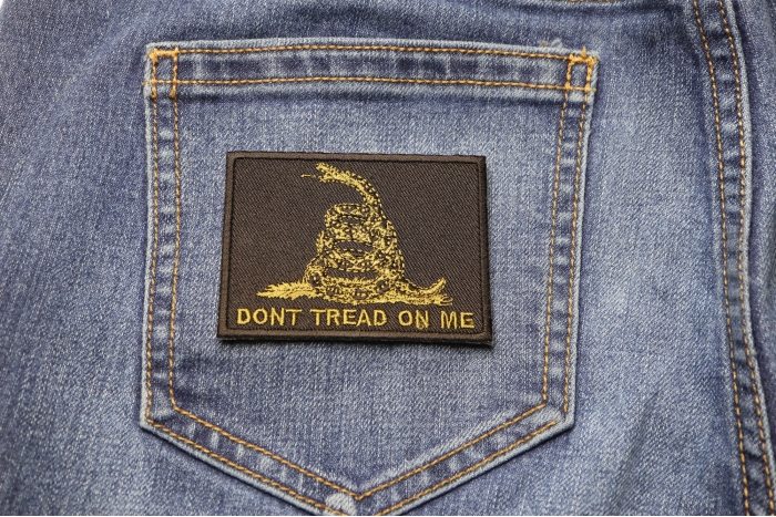 Green Black Gadsden Flag Don't Tread on Me Patch shown on jeans