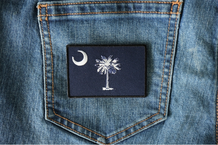 South Carolina Flag Iron on Patch shown on jeans