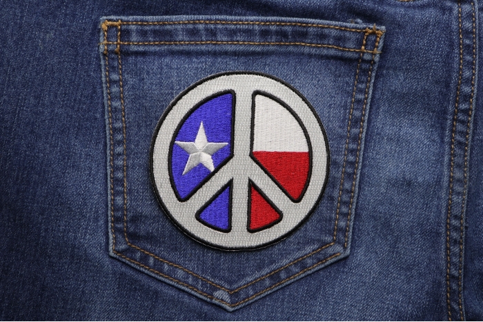 White Texas Peace Patch shown on jeans