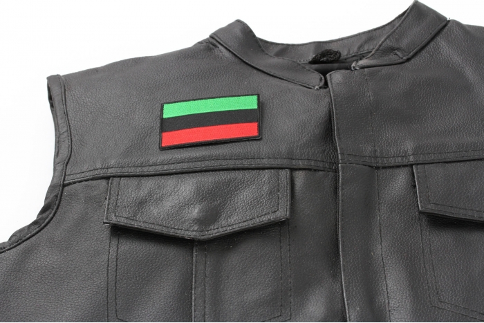 African Flag Patch - 3x2 inch. Embroidered Iron on Patch shown on leather vest