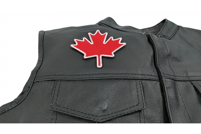 Canada Maple Leaf Patch - 4x4 inch. Embroidered Iron on Patch shown on leather vest