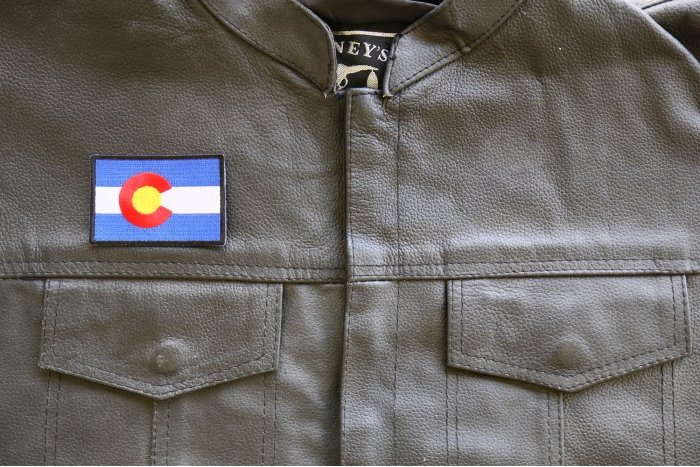 Colorado State Flag Patch shown on leather vest