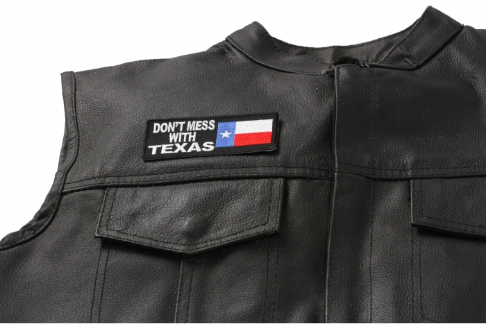 Don't Mess With Texas Patch With Flag - 4x1.5 inch shown on leather vest