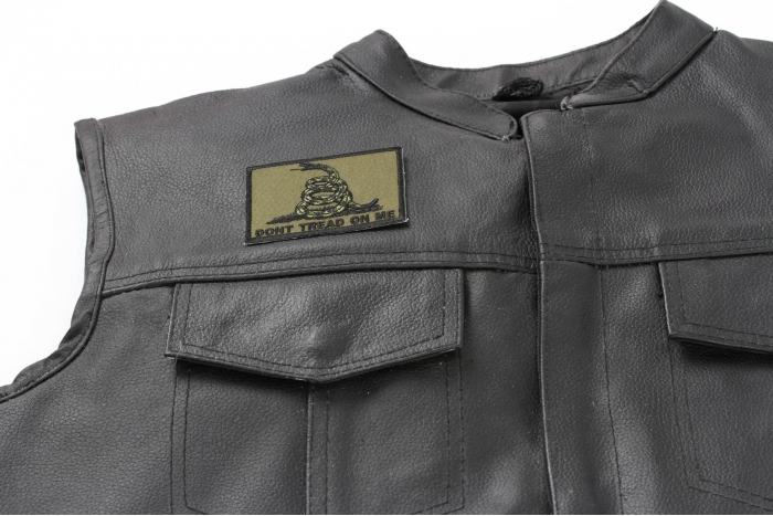 Don't Tread On Me Gadsden Flag Black Over Army Green Patch - 3x2.25 inch. Embroidered Iron on Patch shown on leather vest