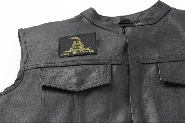 Green Black Gadsden Flag Don't Tread on Me Patch - 3x2.25 inch. Embroidered Iron on Patch shown on leather vest