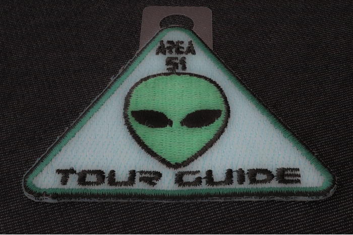 Area 51 Tour Guide Funny Iron on Patch Alien Head diagonal view
