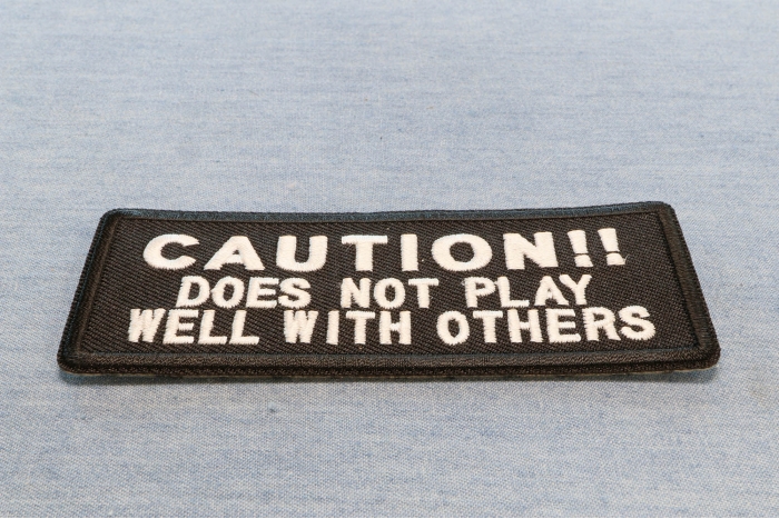 Caution Does Not Play Well With Others Funny Iron on Patch diagonal view