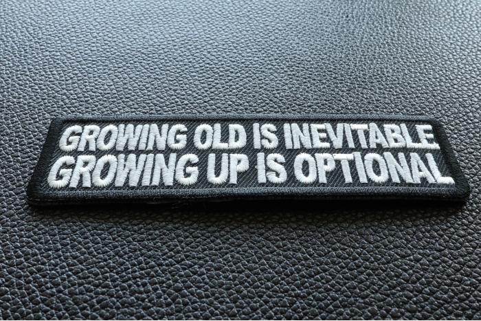Growing Old Is Inevitable Growing Up Is Optional Funny Iron on Patch diagonal view