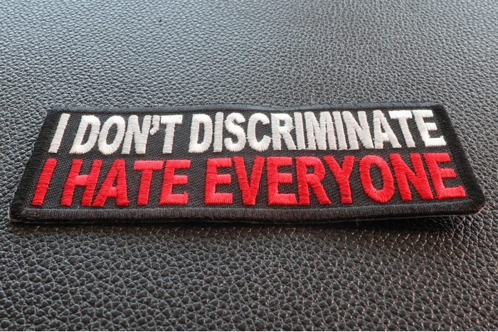 I Don't Discriminate I Hate Everyone Funny Iron on Patch diagonal view