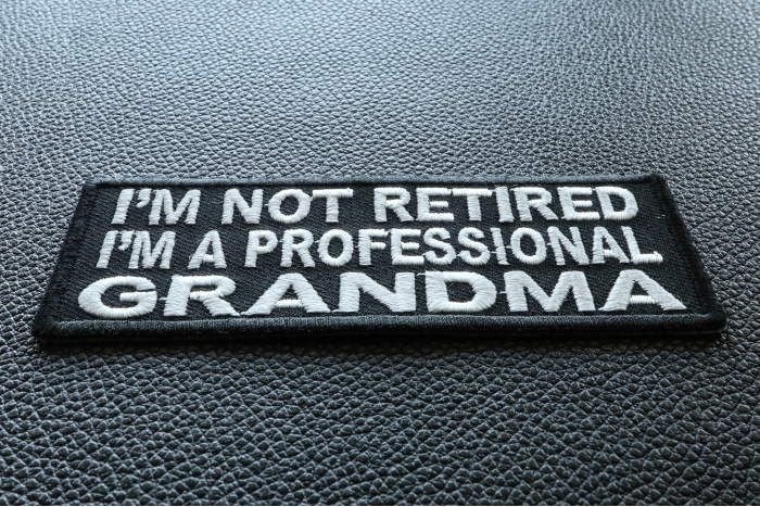 I'm Not Retired I'm A Professional Grandma Funny Iron on Patch diagonal view