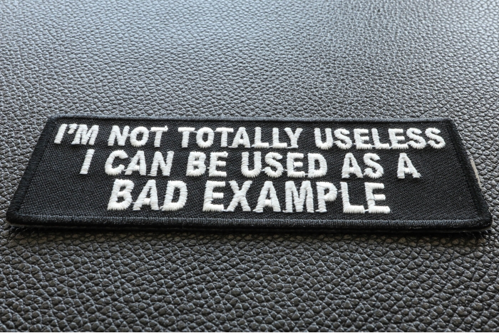 I'm Not Totally Useless I Can Be Used As A Bad Example Funny Iron on Patch diagonal view